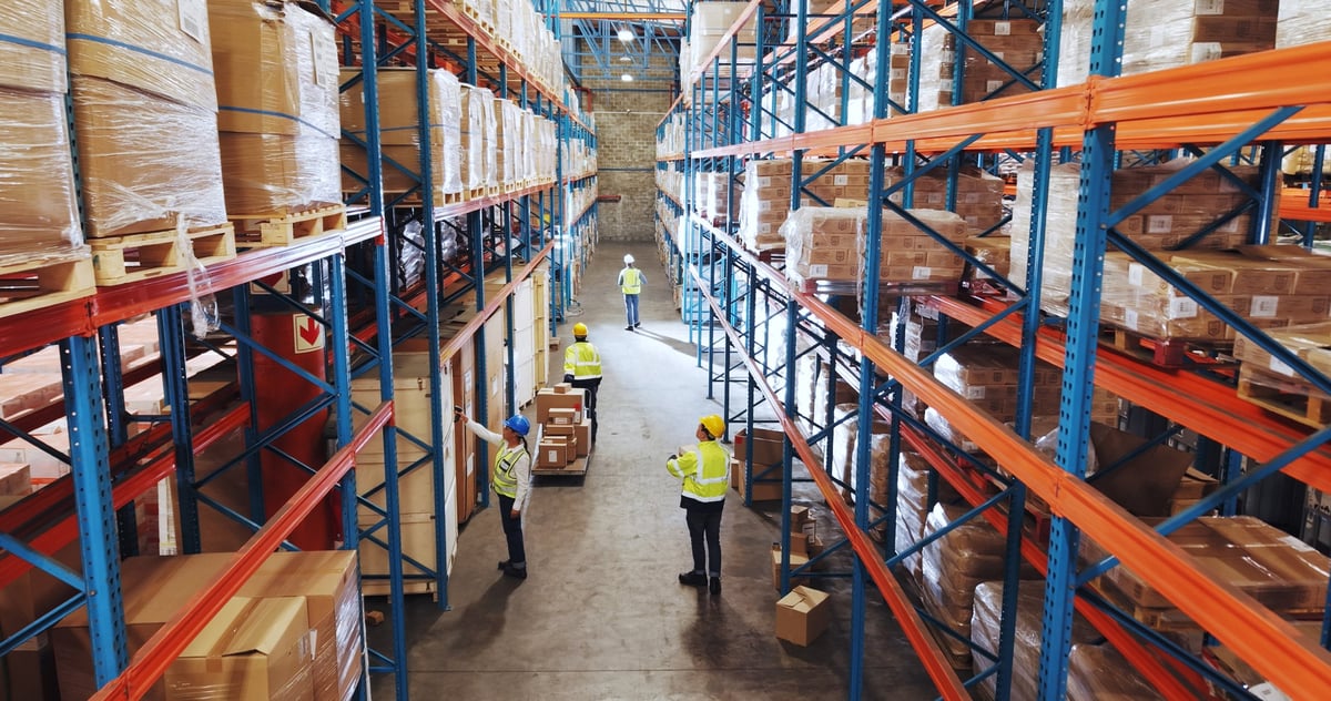 Team inspecting logistics, boxes and packaging in warehouse for supply chain management